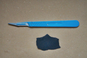 Carta abrasiva e cutter